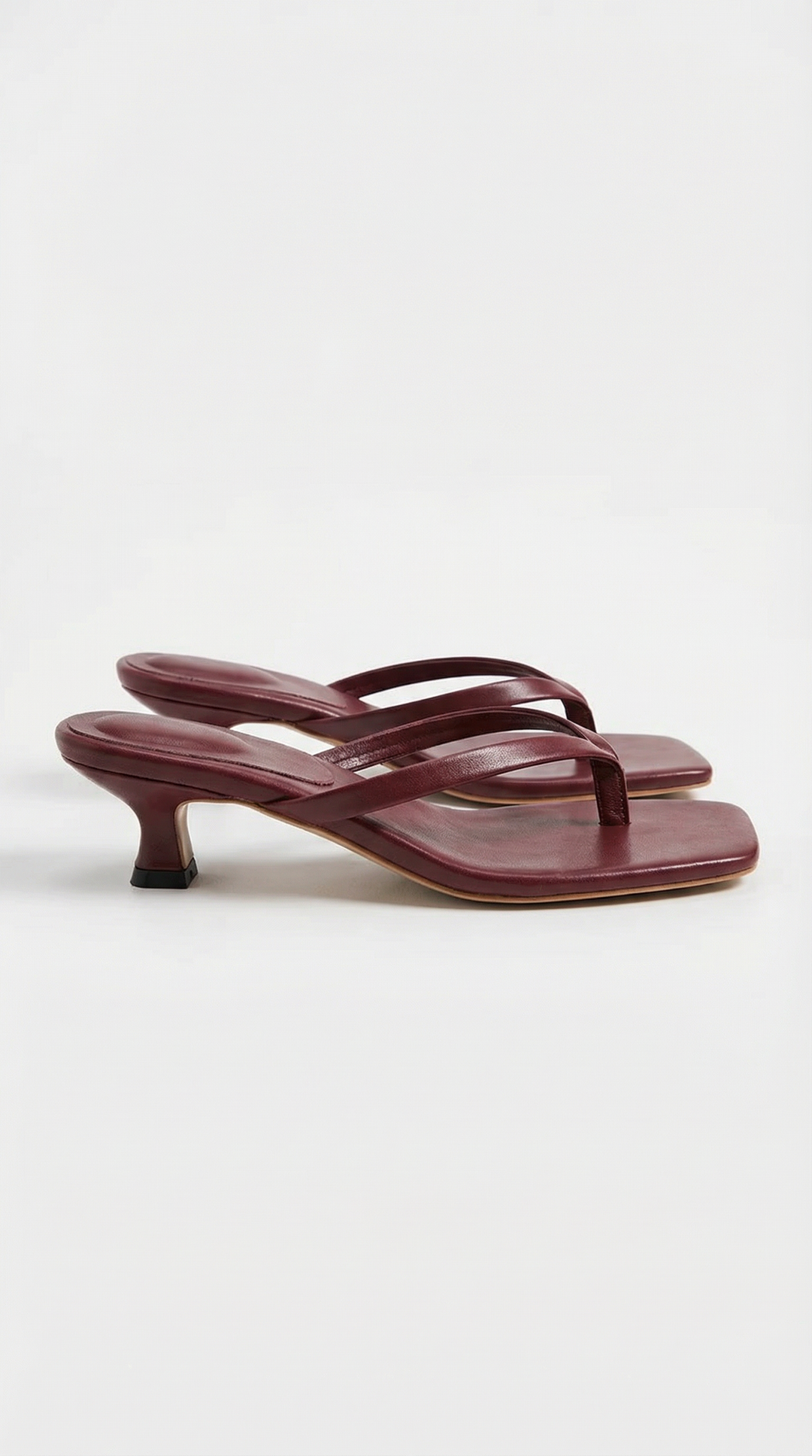 Women's dress sandals: elegant square toe, thong strap, and a fashionable kitten heel.