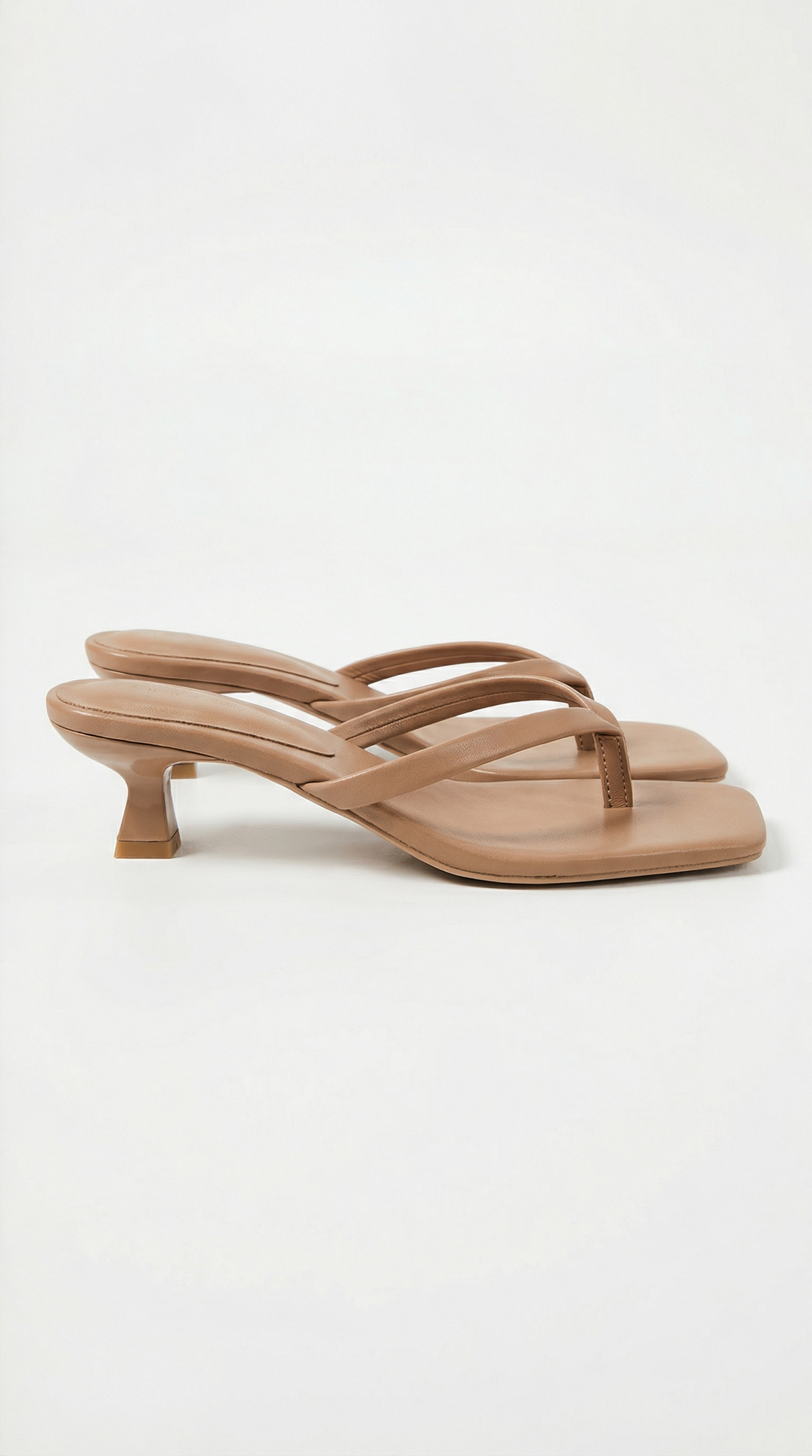 Elegant women's thong kitten heel sandals with a modern square toe, perfect for evening wear.