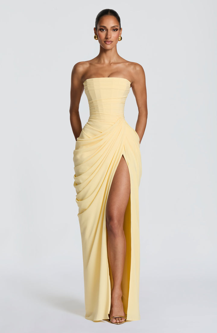Elegant women's strapless maxi dress with a sophisticated corset bodice and sleek column skirt, perfect for formal events.