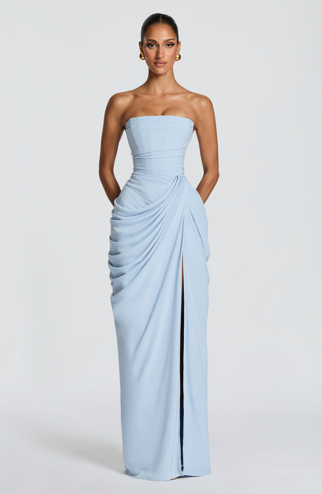 Chic strapless long evening gown featuring a sculpted corset top and a flowing column skirt for women.