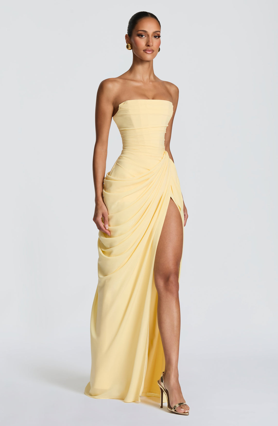 Sophisticated women's party dress: strapless, long, with a figure-flattering corset and a graceful column skirt.