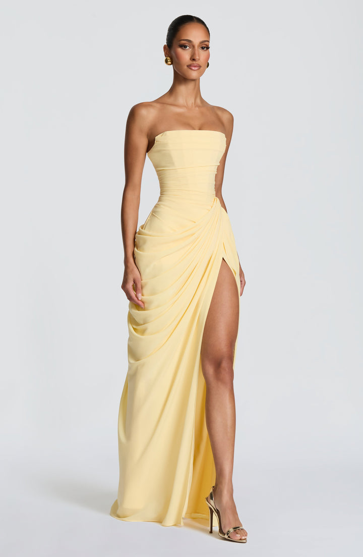 Sophisticated women's party dress: strapless, long, with a figure-flattering corset and a graceful column skirt.
