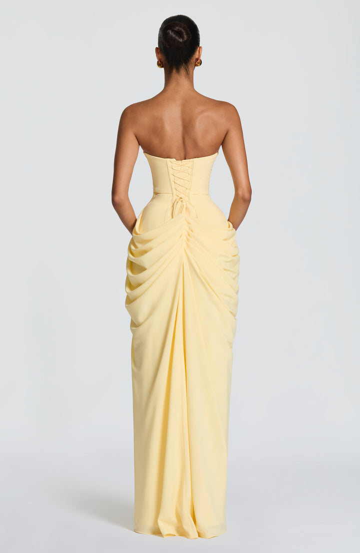 Chic women's strapless formal dress, a maxi design with a figure-hugging corset and a flowing column skirt.