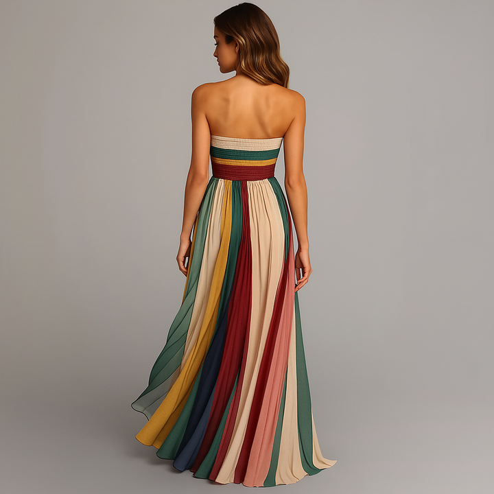 Sophisticated women's strapless pleated maxi dress, a vibrant vertical stripe gown perfect for formal events.