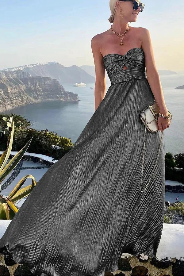 Formal strapless pleated maxi dress, perfect as a wedding guest or elegant party dress.