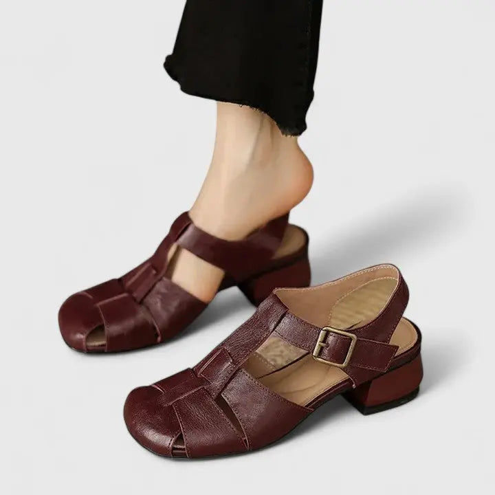 Stylish women's block heel sandals with a modern square toe, offering comfortable and elegant footwear.