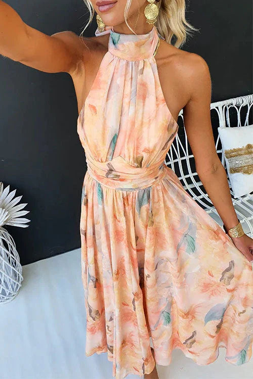 Sleeveless women's halter floral maxi dress, ideal for elegant summer occasions