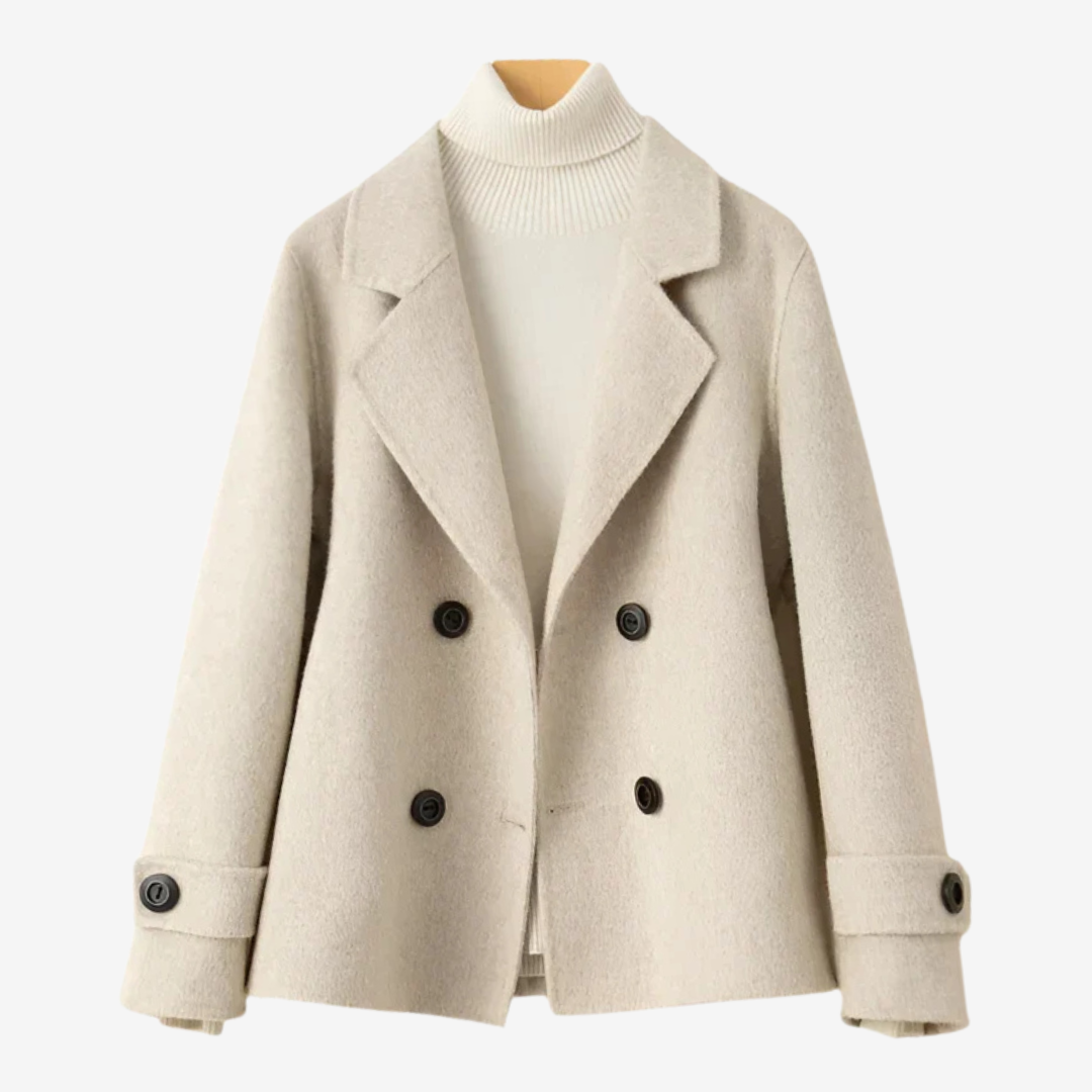 Classic women's tailored blazer, featuring elegant design and comfortable fit. Perfect for professional or everyday wear.