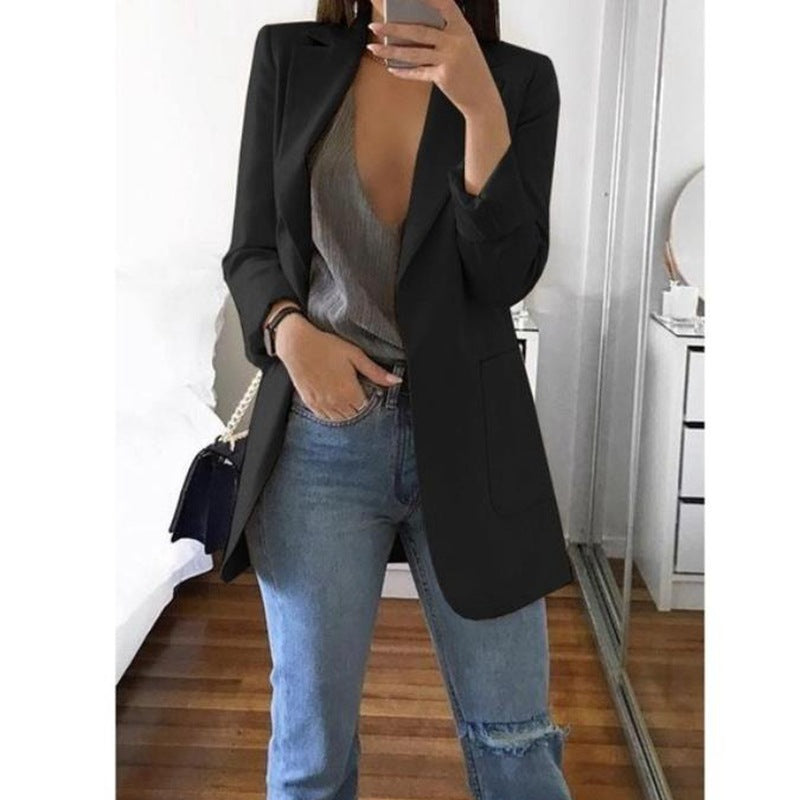 Women's elegant tailored blazer, perfect for sophisticated business casual or professional office attire.