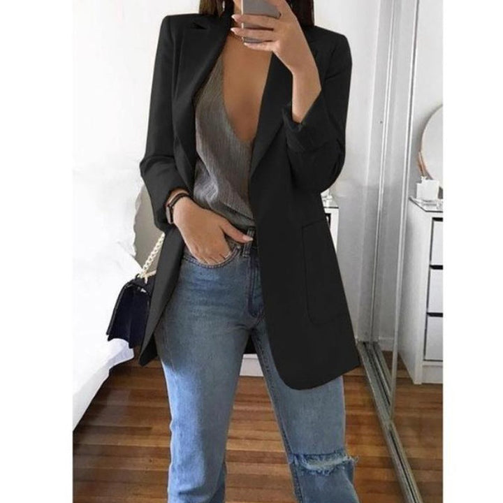 Women's elegant tailored blazer, perfect for sophisticated business casual or professional office attire.
