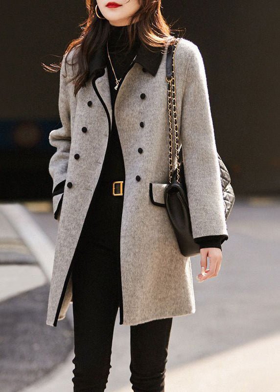 Elegant women's tailored coat for sophisticated style. Classic, structured outerwear for fall & winter fashion.