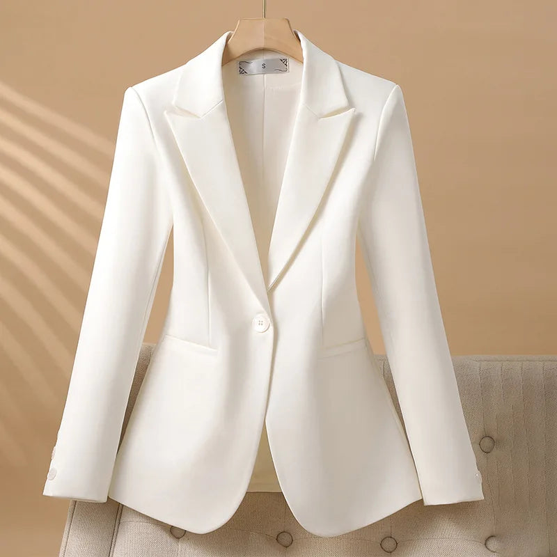 Women's fitted tailored blazer, an elegant long sleeve jacket for office wear. Professional & versatile formal fashion.