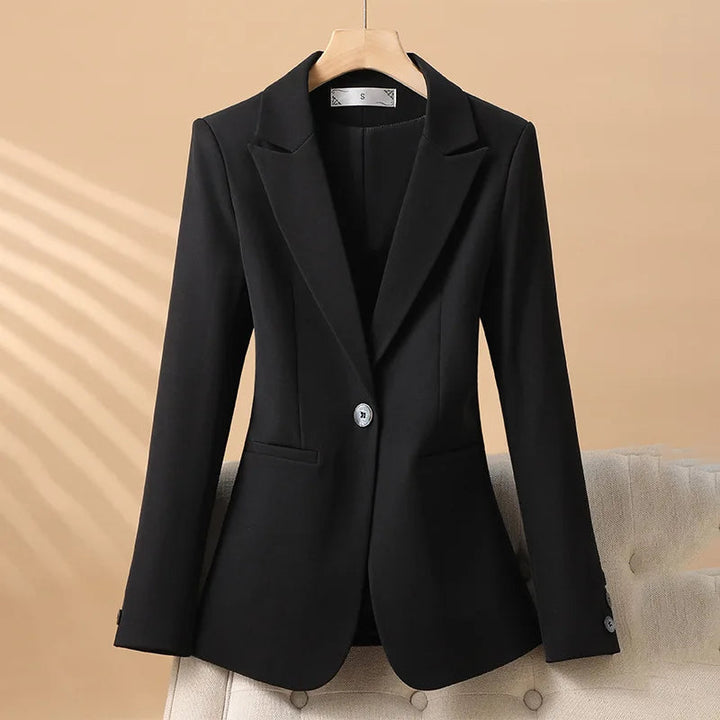 Chic women's fitted blazer, a tailored long sleeve jacket perfect for elegant office wear & professional style.
