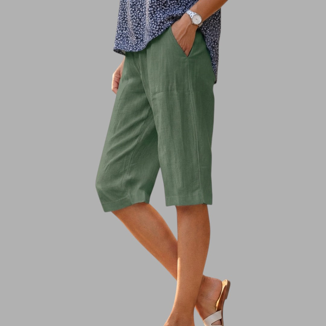 Versatile women's tailored knee-length shorts, a classic smart casual piece for any summer wardrobe.