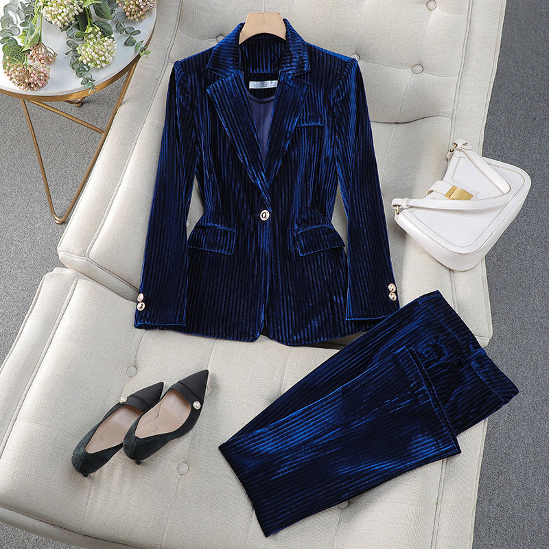 Women's coordinated suit set featuring a long tailored blazer and trouser pants, ideal for formal occasions.
