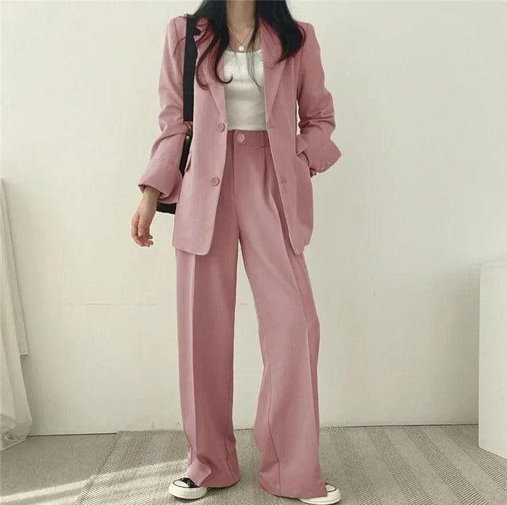 Matching set: women's tailored long blazer and trousers for a polished look