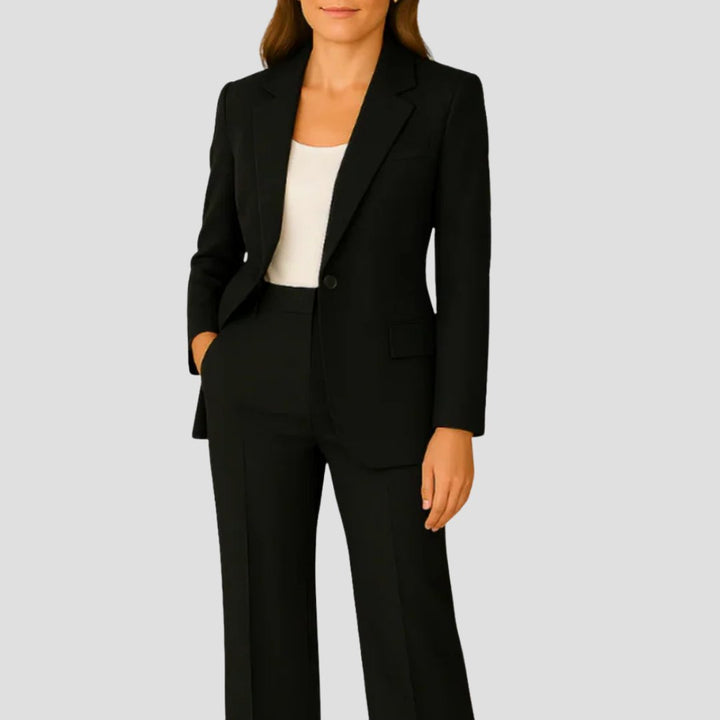 Sophisticated women's tailored suit featuring a classic lapel blazer and trendy wide leg trousers for business.