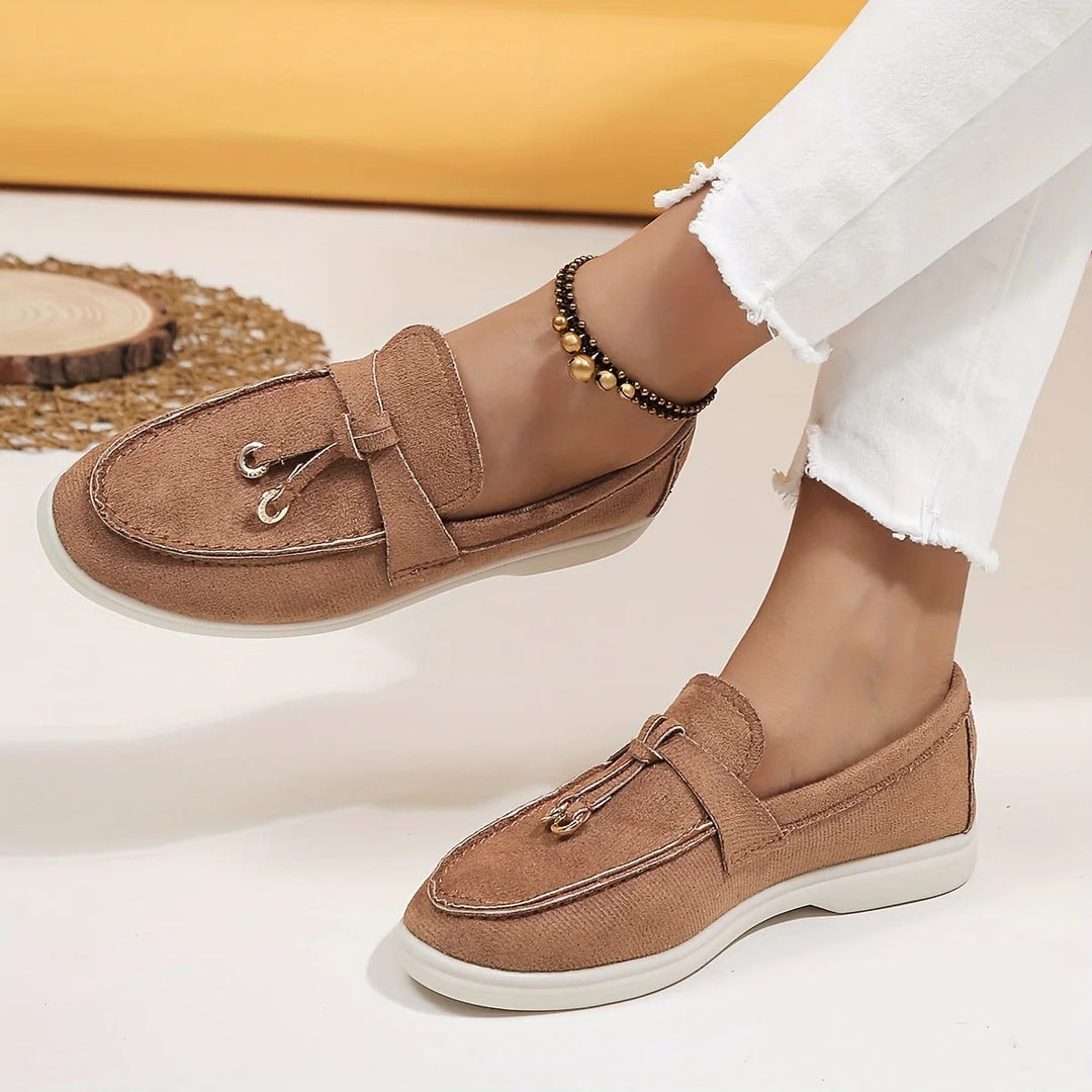 Elegant women's tassel loafers, perfect slip-on flats for everyday chic and comfort.