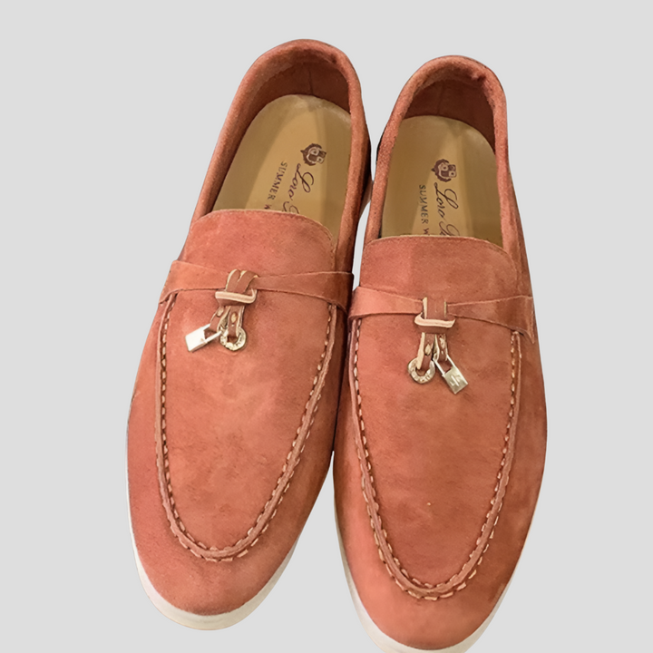 Close-up of elegant women's tassel loafers, showcasing the intricate detail of the chic slip-on flats.