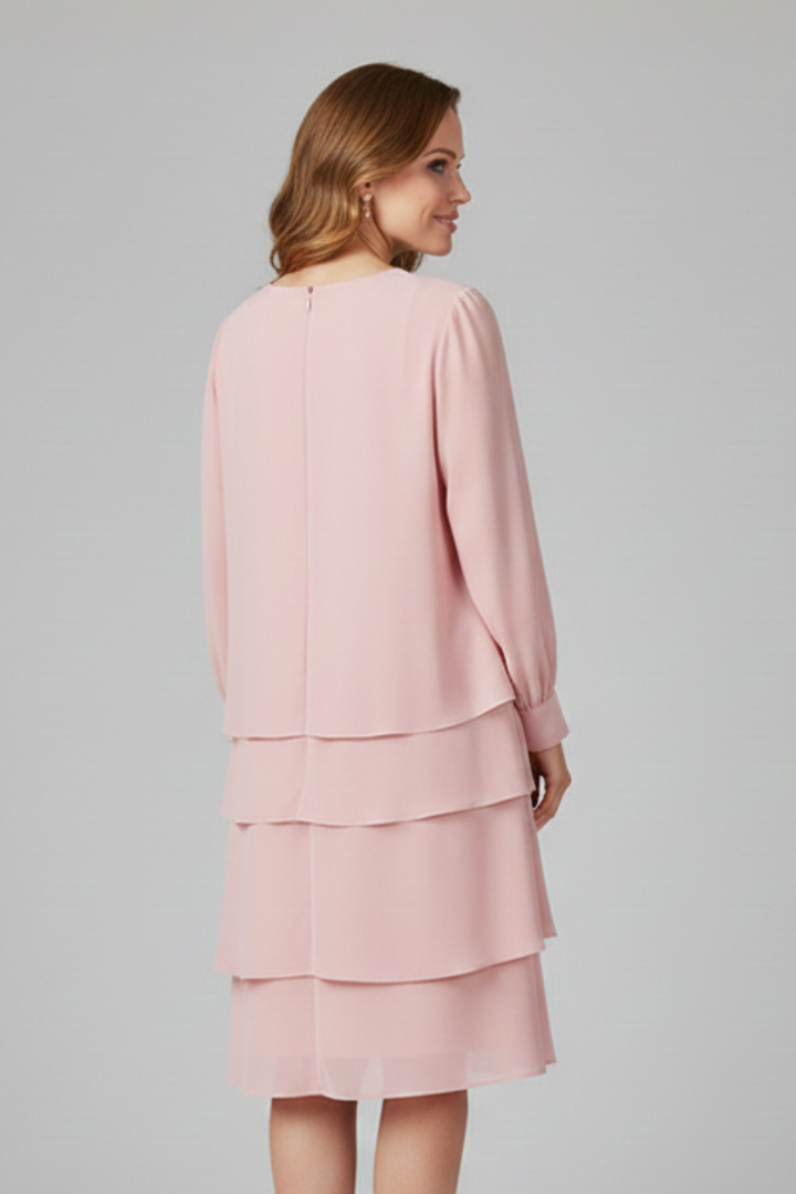 Stylish women's tiered dress with long sleeves and a round neck, ideal for a comfortable, elegant look.