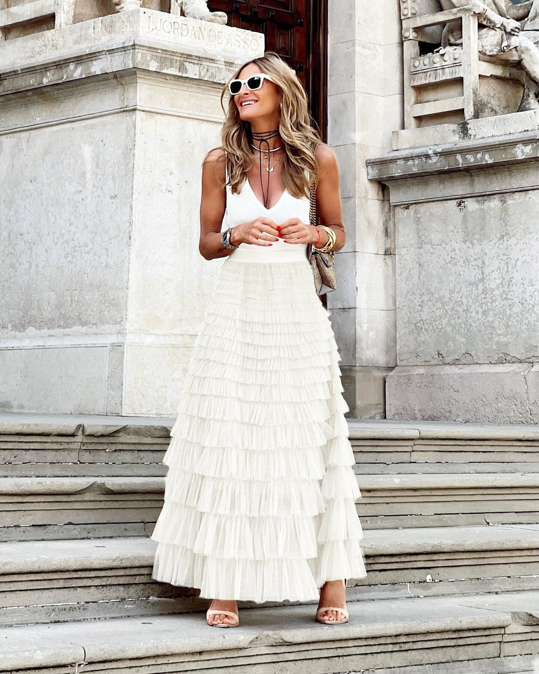 Long tiered maxi skirt for women with cascading ruffled layers, suitable for special occasions.