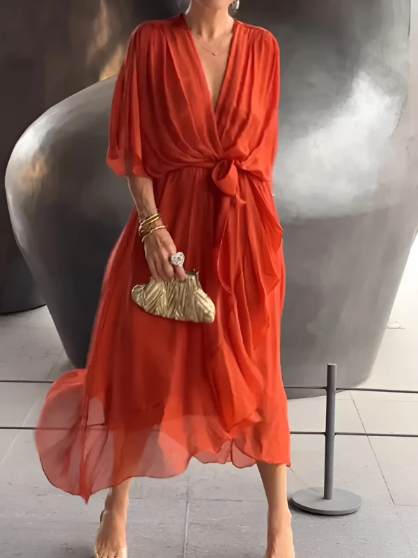 Versatile women's midi wrap dress, offering an elegant, flattering fit for both everyday wear and evening events.