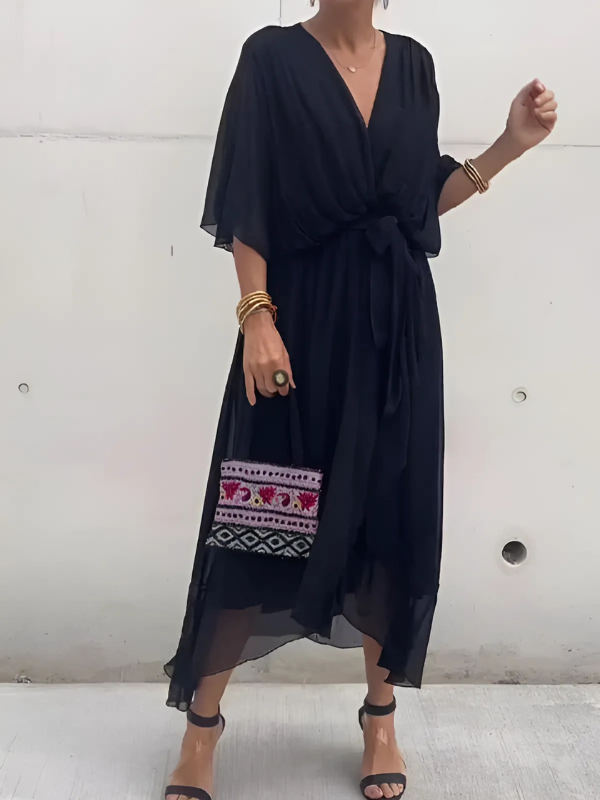 Chic women's wrap midi dress with a flattering silhouette, ideal for elegant everyday wear or special occasions.