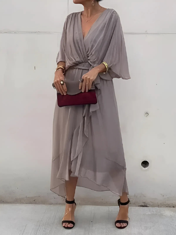 Stylish women's wrap midi dress. Elegant, flattering, and comfortable for timeless everyday or evening wear.