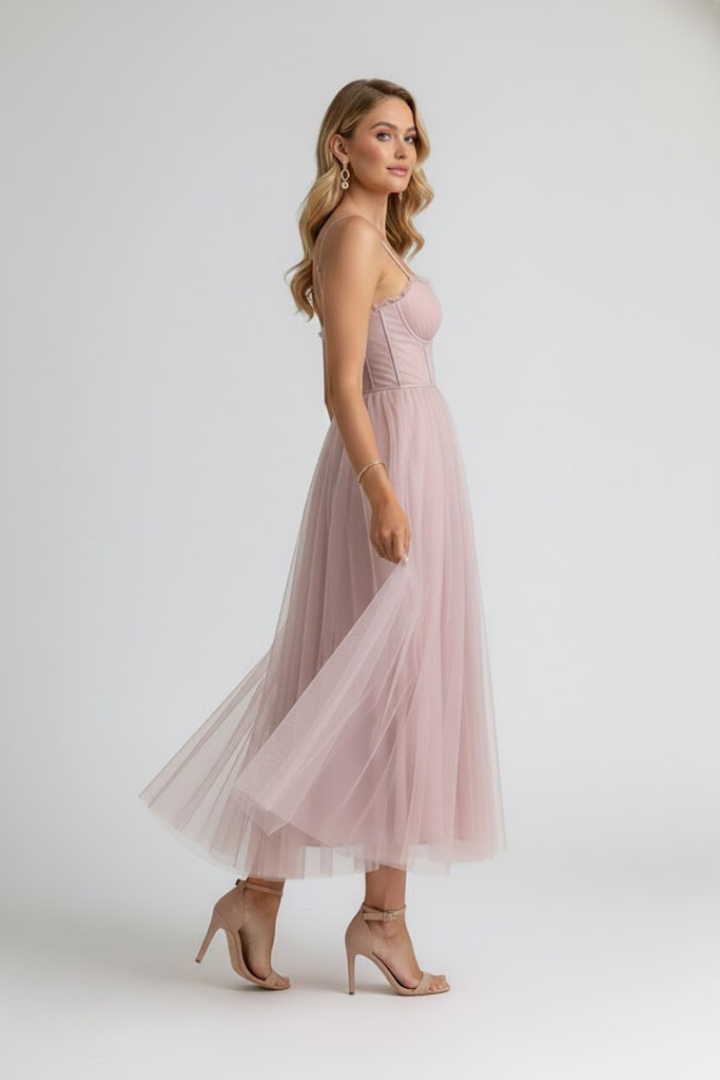 Flowy tulle midi dress for women, elegant design with sweetheart neckline & delicate spaghetti straps.