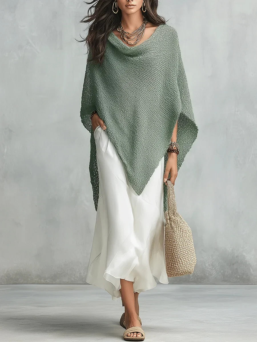 Flowing batwing poncho and comfortable maxi dress. Chic women's two-piece outfit ensemble.