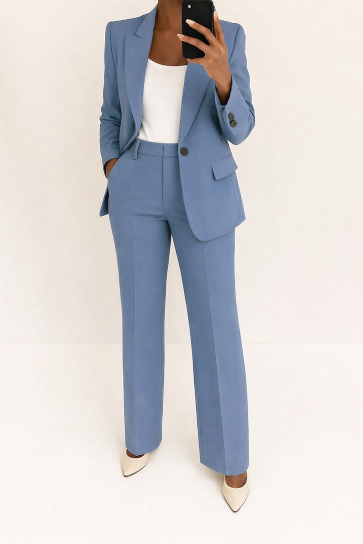 Elegant women's two-piece set featuring a tailored blazer and chic wide-leg pants. Perfect for formal and business attire.