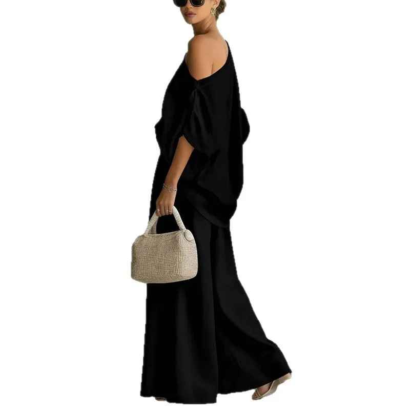 Women's casual chic two-piece set featuring a stylish asymmetric drape top and comfortable elastic waist wide-leg pants.