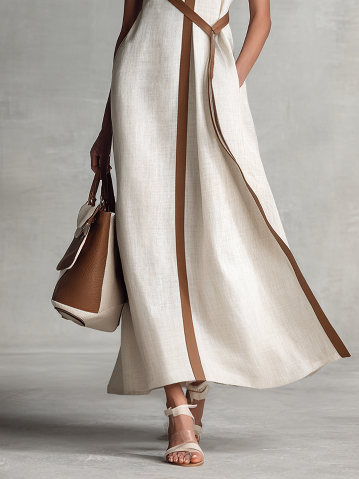 Elegant women's V-neck A-line maxi dress, sleeveless and flowy, perfect for summer weddings or special events.