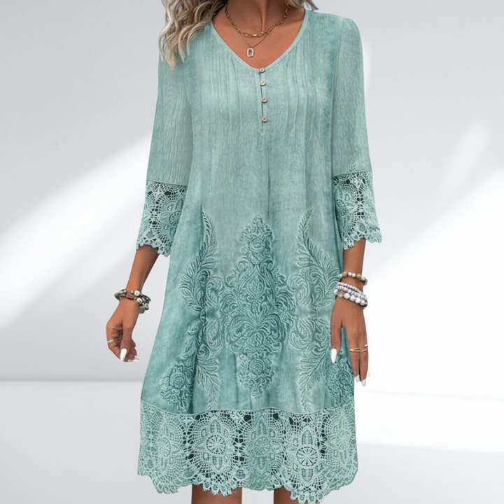 Elegant women's V-neck A-line midi dress with intricate embroidery, perfect for spring and summer casual wear.