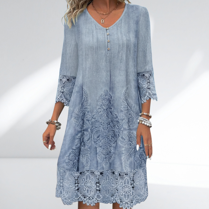 Sophisticated women's V-neck midi A-line dress featuring elegant 3/4 sleeves and delicate embroidery details.
