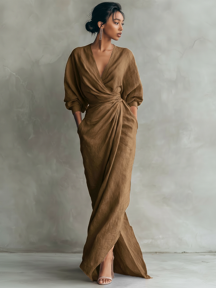 Chic women's V-neck maxi dress with stylish batwing sleeves and draped fit for elegant fashion.
