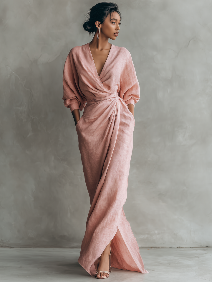 Fashionable women's evening maxi dress featuring a flattering V-neck and elegant batwing sleeves.