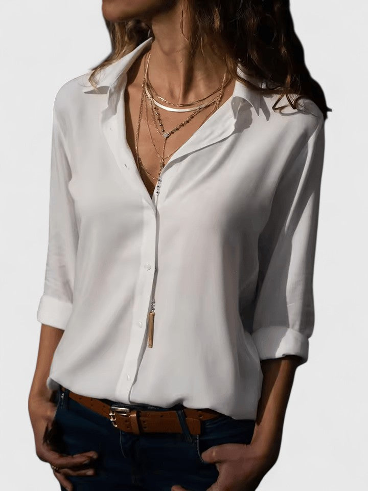 Fashionable women's V-neck blouse, a versatile and elegant summer top. Ideal for a relaxed yet chic look.