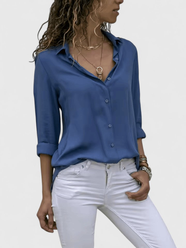 Relaxed fit women's V-neck blouse, an elegant and versatile top that transitions seamlessly from office to casual.
