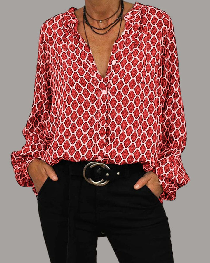 Versatile V-neck blouse for women. Elegant long sleeve top, ideal for casual, formal, or everyday wear.