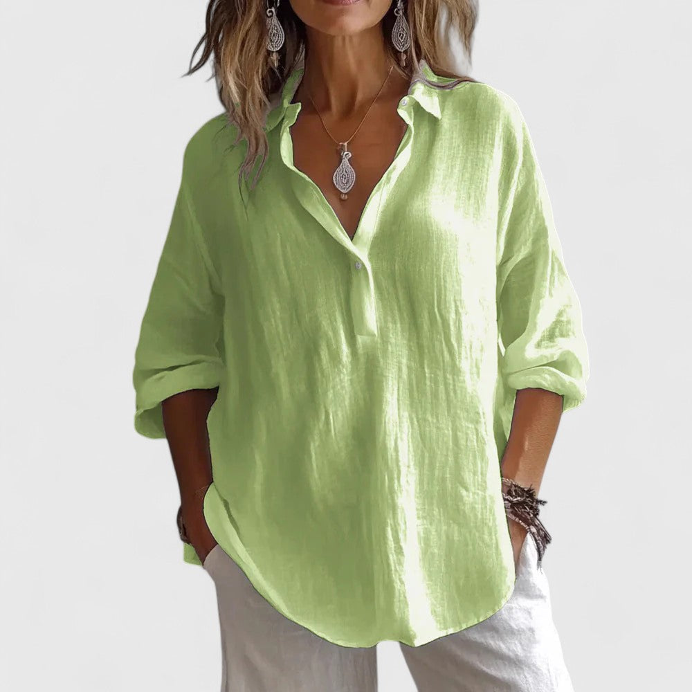 Comfortable women's elegant V-neck blouse in a versatile fabric, ideal for everyday wear, office or summer fashion.