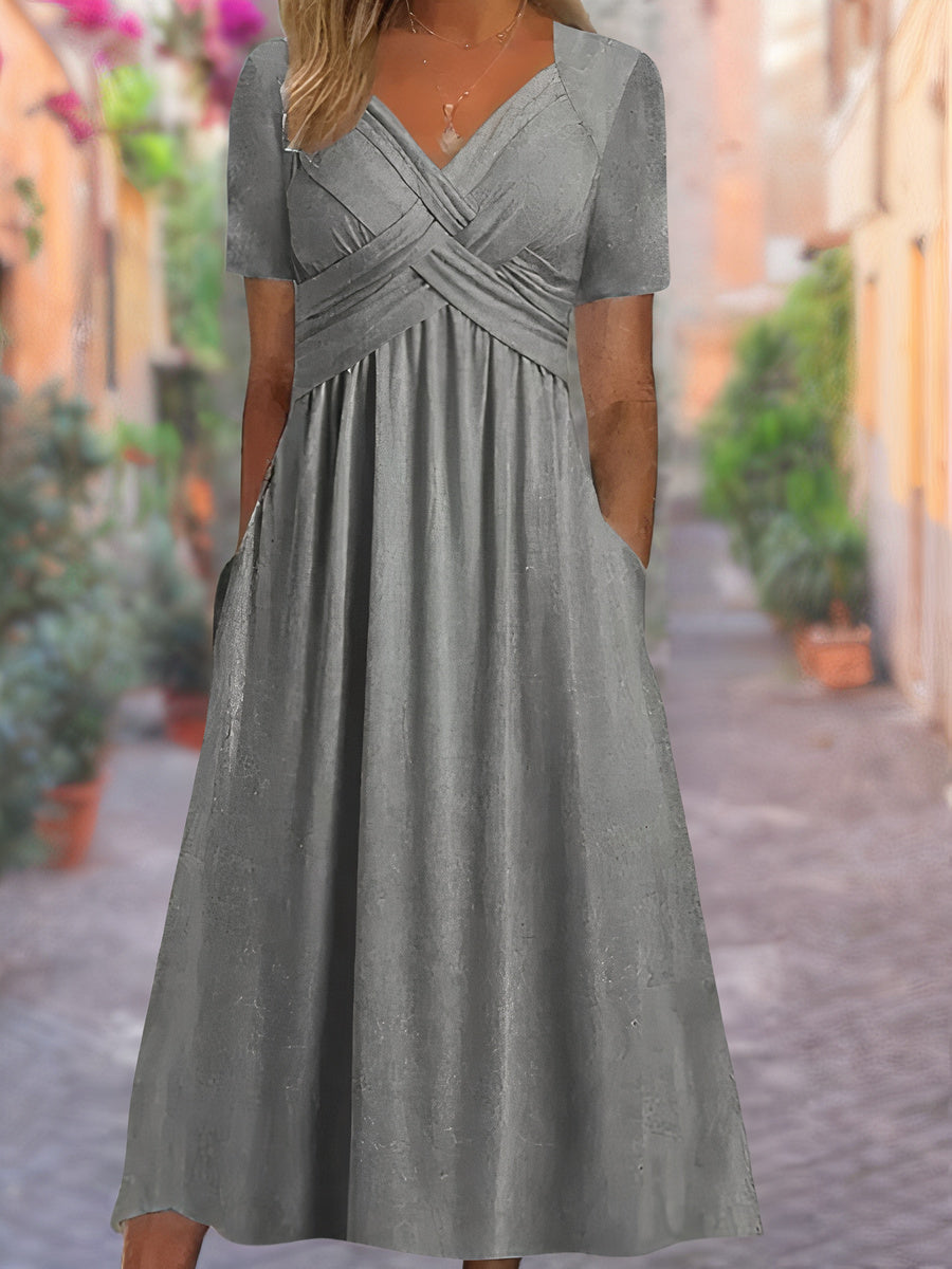 Beautiful women's fashion midi dress with a comfortable V-neck and eye-catching crisscross bodice.