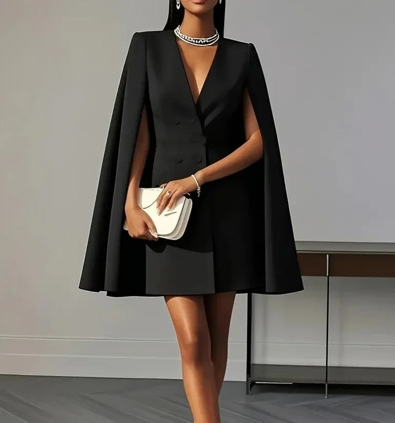 Modern women's double-breasted blazer mini dress, versatile for business casual or a chic cocktail party.