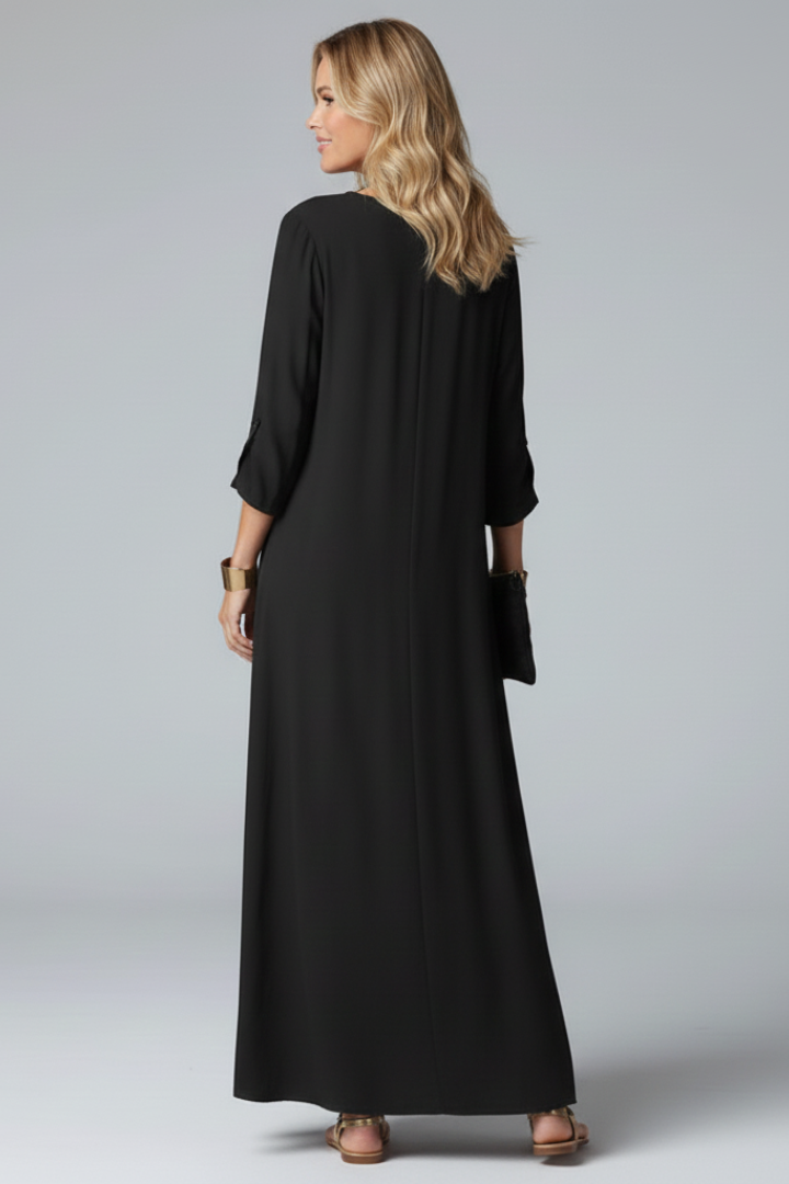 Long sleeve V-neck maxi dress for women. Ankle-length, elegant, and perfect for a sophisticated look.