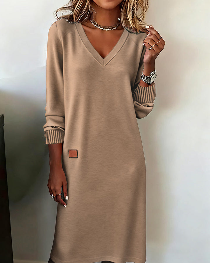 Versatile women's V-neck long sleeve midi dress. An elegant choice for office, work, business or casual settings.