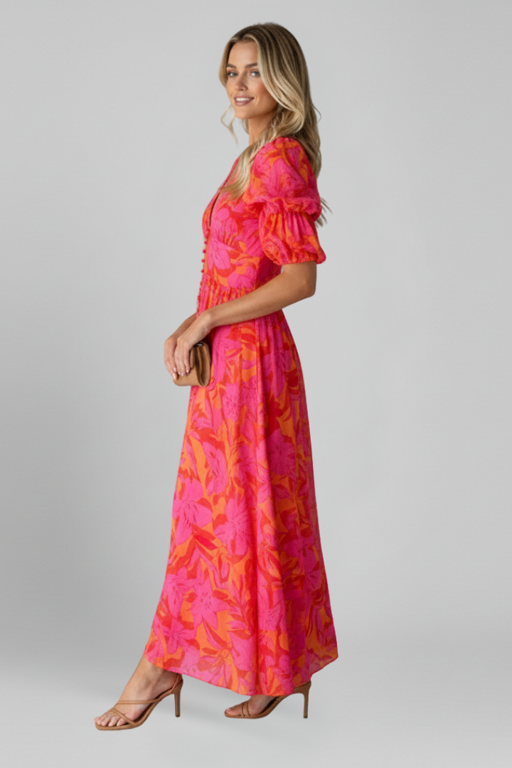 Red printed women's V-neck maxi dress with chic puff sleeves. A beautiful long flowy dress for spring and summer.
