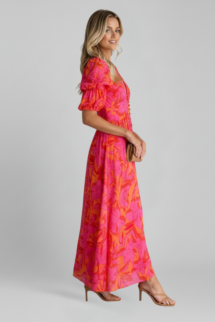 Flowy printed V-neck maxi dress for women with elegant puff sleeves. Comfortable long dress, perfect for spring/summer fashion.