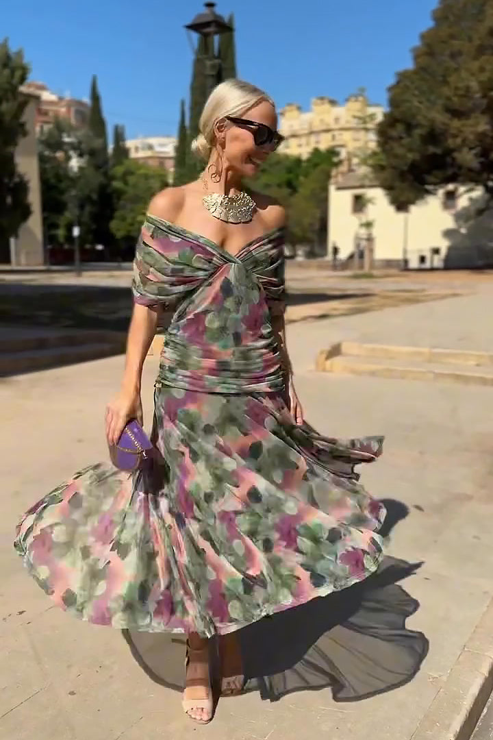 Women's elegant V-neck maxi dress with draped sleeves, ideal for wedding guests.