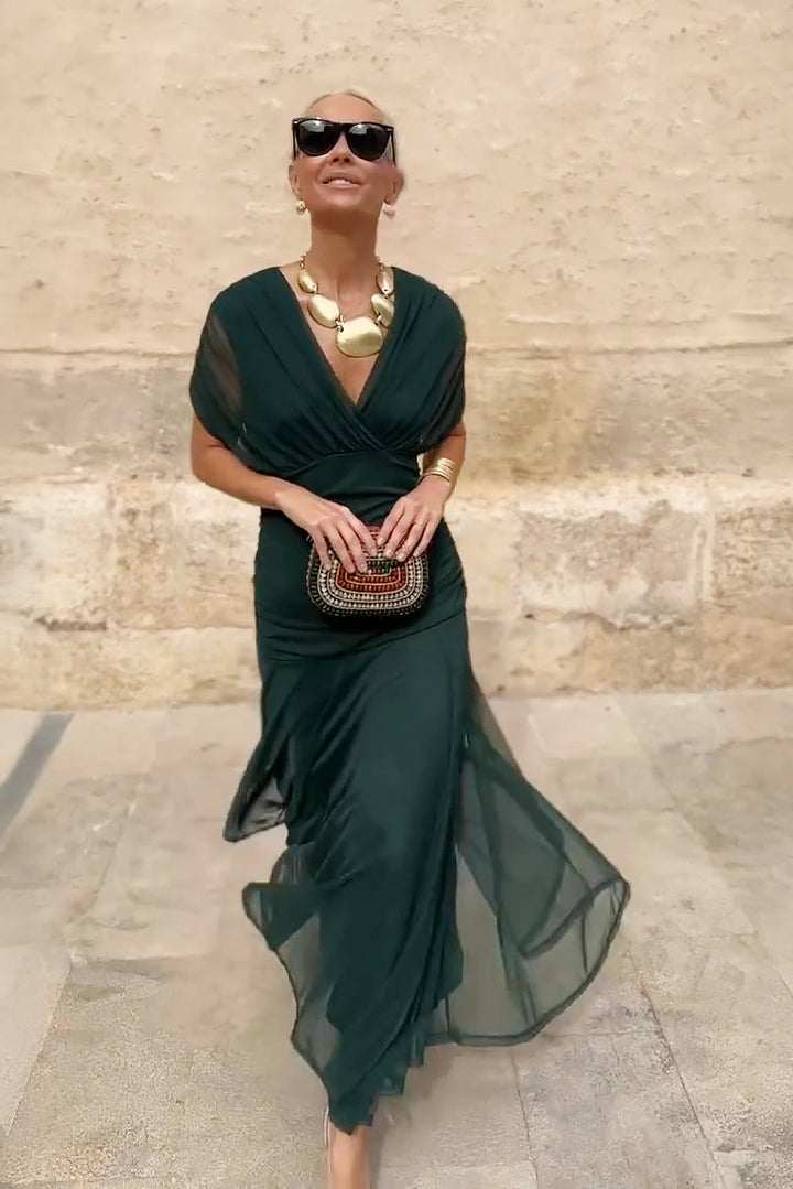 Elegant women's maxi V-neck dress, draped sleeves, ideal for formal evening events.