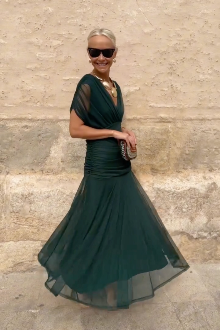 Flowy V-neck maxi dress for women with draped sleeves, perfect for elegant parties.